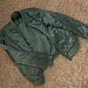 Beautiful Silky Light blue Forever 21 Jacket. It’s Cropped and Puffed.